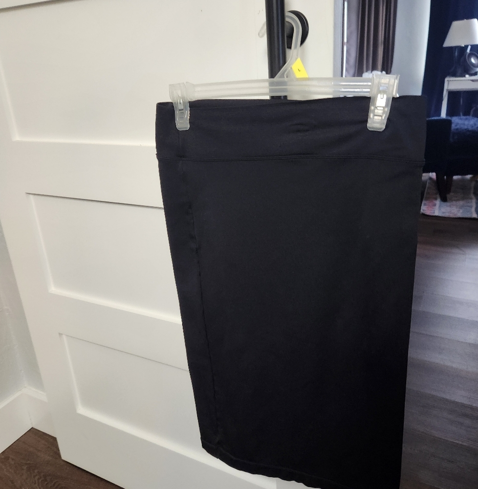 Black spandex and nylon tight pencil skirt.